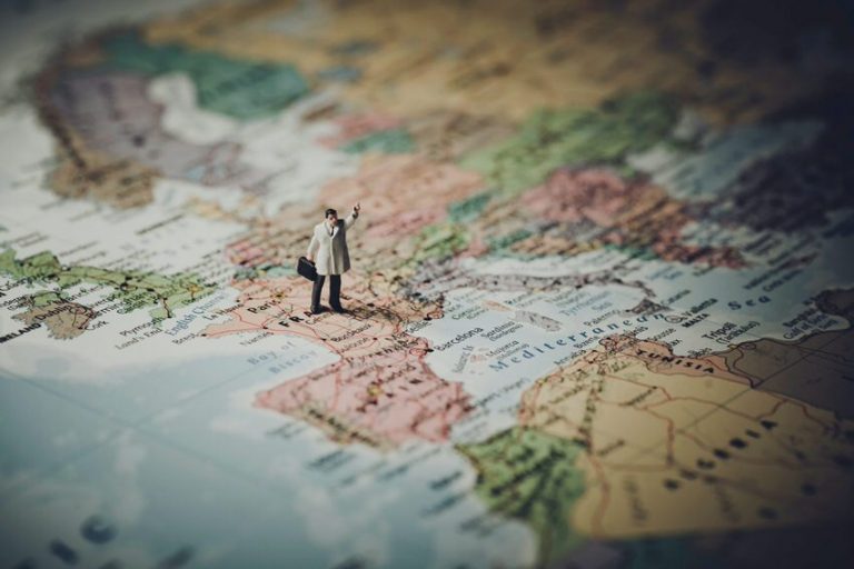 Montessori Education and the new World Order - Map with a man on top - International Montessori School in Sotogrande, Cádiz